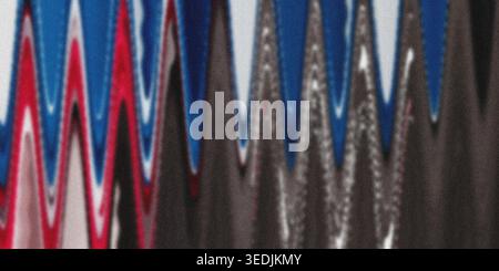 A vibrant abstract background featuring a repeating zigzag pattern in various colors including red, blue, white, and dark grey. Stock Photo