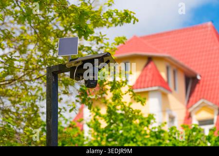 Wireless solar powered security camera Stock Photo