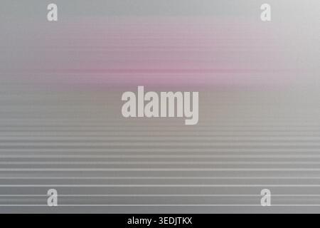 A grainy, light gray background with a soft, diffused pink horizontal band and subtle parallel lines, creating a calm and modern atmosphere. Stock Photo