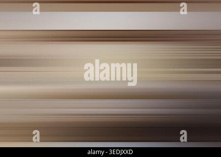 An abstract background featuring soft, horizontal motion blur lines in varying shades of beige, tan, and brown, creating a smooth and elegant texture. Stock Photo