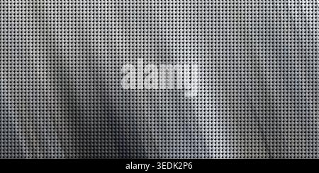 This image features a close-up of a grey fabric with a textured surface composed of small dots. The fabric appears to have a subtle shadow effect, add Stock Photo