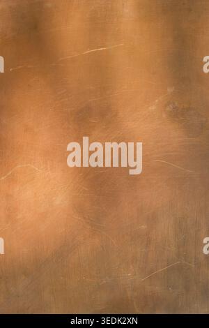 Warm сopper surface with different lighting. Minimal background. Industrial backdrop for design. Copy space. Stock Photo