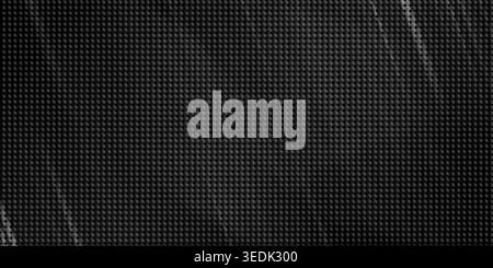 A close-up view of a black carbon fiber texture featuring a subtle gray line pattern, showcasing a detailed and intricate design with a mix of dark an Stock Photo