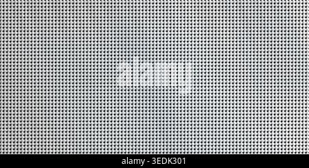 This image showcases a detailed view of a gray and white textured mesh material surface, featuring a grid-like pattern with small, evenly spaced dots Stock Photo