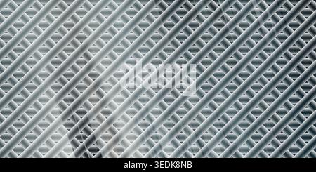An abstract background featuring a diagonal grid of intersecting silver tubes or lines, creating a sleek and metallic geometric visual effect. Stock Photo