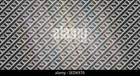 Complex abstract pattern of overlapping metallic bars in a grid structure with soft, multi-colored light reflections and industrial feel. Stock Photo