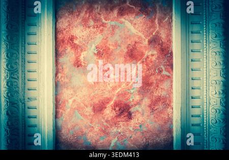 Marble with carved stone frame. Architectural detail. Vintage background.Toned photo. Vignette. Stock Photo