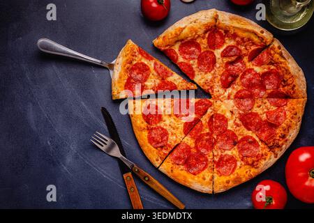 Hot homemade Pepperoni pizza, top view. Stock Photo