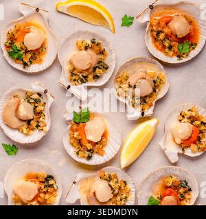 Cooked scallops with sauce on a baking sheet Stock Photo