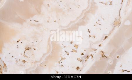 Luxurious marble stone texture featuring elegant creamy white and warm beige layers, creating a sophisticated abstract background Stock Photo