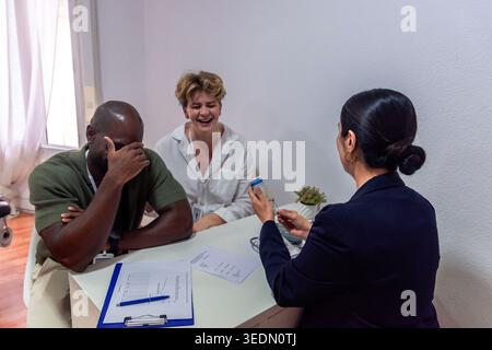 Healthcare professionals having a positive medical consultation Stock Photo
