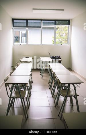 Contemporary academic setting with rows of seating in empty room Stock Photo
