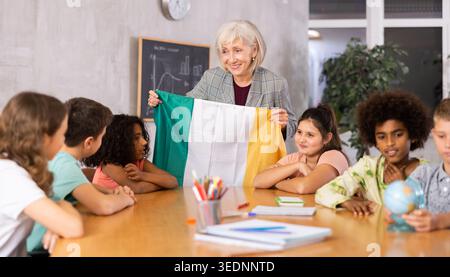 students listen to teacher who talks about Ireland Stock Photo