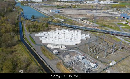 Aerial view of the RWE Westfalen power plant battery storage facility with white containers and electrical infrastructure near the canal in Hamm, Nord Stock Photo