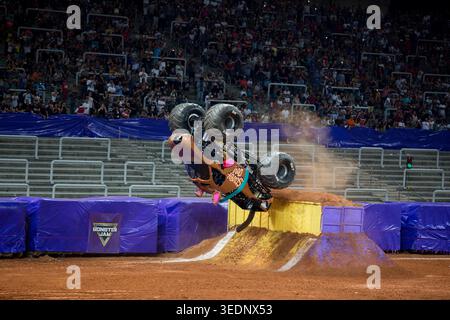 Scooby-Doo makes a backwards flip during a round of racing. Monster Jam ...