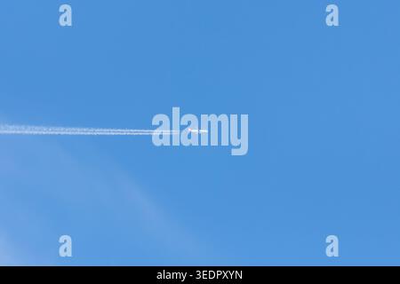 Soft wispy cirrus clouds move across a clear blue morning sky, showing classic high‑level cloud patterns. Blayney, NSW, Australia. Stock Photo