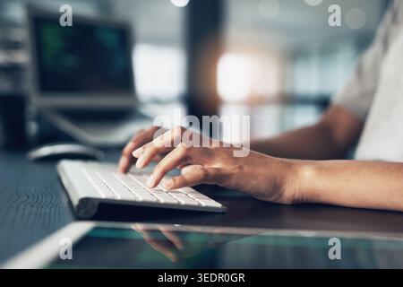 Coding, typing and hands of person on computer for programming, website and software design. Office, programmer and worker with keyboard for web Stock Photo