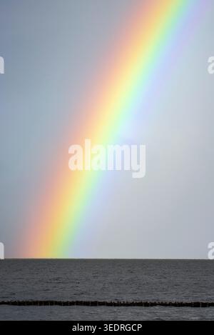 Rainbow over the Wadden Sea Stock Photo