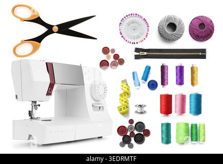 Sewing machine and different tailor's supplies on white background Stock Photo