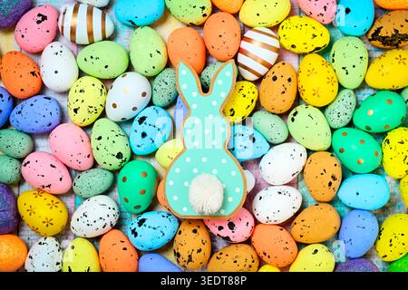 Easter bunny figurine with Easter eggs Stock Photo