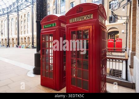 England, London, Southwark, Hays Galleria, Traditional Red Telephone Boxes Stock Photo