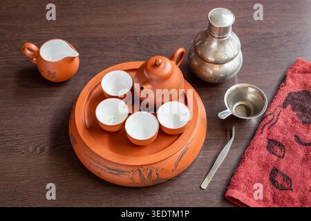 Tea pot and cups served with extra hot water, Chinese style Stock Photo
