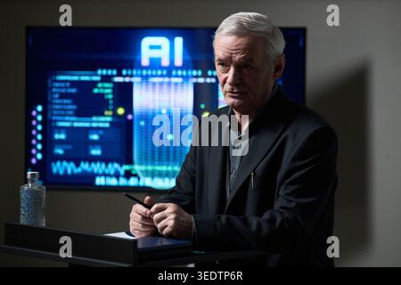 Senior Man Presenting Ai Strategy in Corporate Technology Meeting Stock Photo