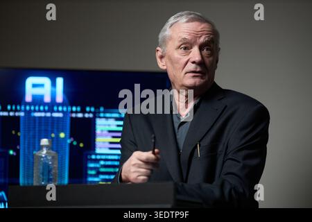 Senior Man Presenting Ai Strategy during Business Conference Stock Photo