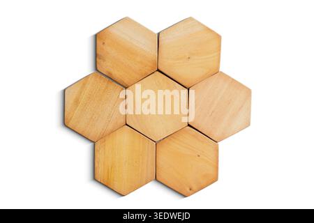 Hexagonal Wooden Tiles Arranged in a Flower Shape. Wooden Hexagon isolated Background. Wooden Material. High quality photo Stock Photo