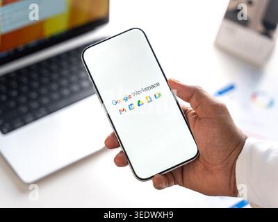 Google Workspace logo is displayed on the screen of a smartphone, in Bangalore, India, on February 28, 2026 Stock Photo