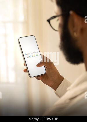 Google Workspace logo is displayed on the screen of a smartphone, in Bangalore, India, on February 28, 2026 Stock Photo