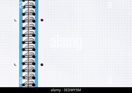 Open squared notebook page presenting blank space for text or drawing Stock Photo
