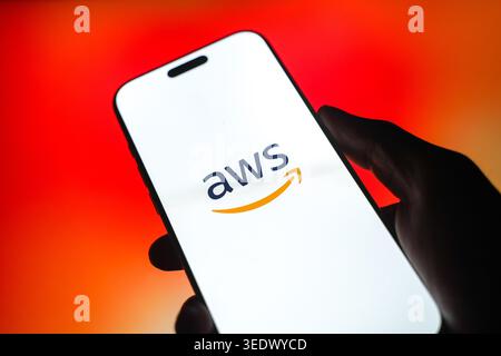 Amazon web services or AWS logo is displayed on the screen of a smartphone, in Bangalore, India, on May 11, 2026 Stock Photo