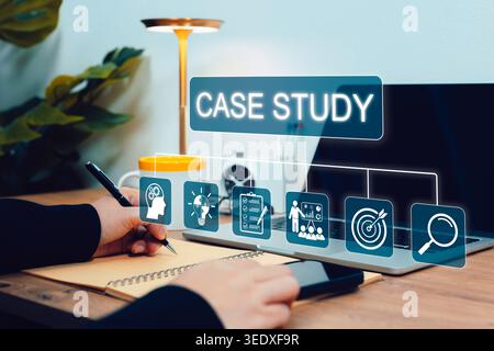 Case study research concept, professional writing notes near laptop with virtual icons for strategy, ideas, checklist, presentation, target, search Stock Photo