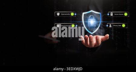 Businessman with smartphone holding glowing cybersecurity shield with lock, data protected, and privacy safe icons. Secure access, cyber defense, digi Stock Photo