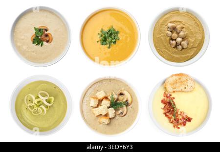 Different tasty soups in bowls isolated on white, collage. Top view Stock Photo