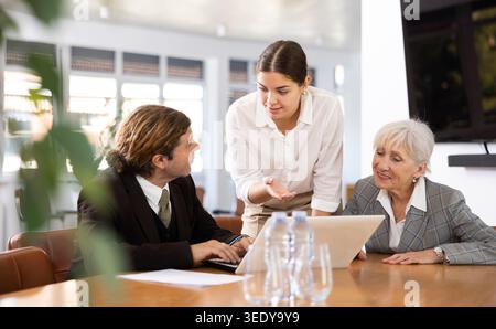 Group of businesspeople having meeting in an office Stock Photo