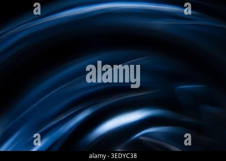 Abstract elegant dark blue fluid curves and glowing motion blur Stock Photo
