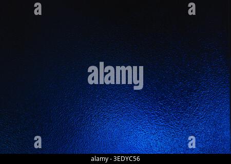 Dark blue frosted glass texture with light gradient background Stock Photo