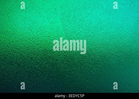 Vibrant bright green frosted glass texture with gradient lighting Stock Photo