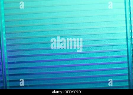 Abstract horizontal striped cyan blue polycarbonate texture background Stock Photo