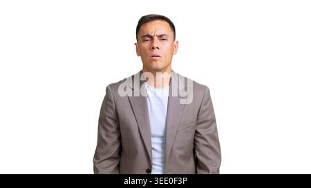 Man feeling puzzled, frowning, and looking with uncertainty Stock Photo