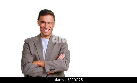 Smiling man with crossed arms showing confident business attitude Stock Photo