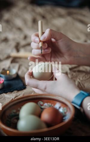 Hand Decorating Easter Egg With Wax Stock Photo