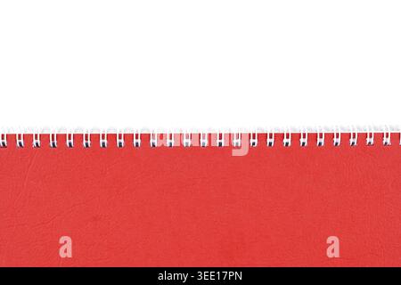 Red notebook cover with spiral binding on white background with copy space Stock Photo