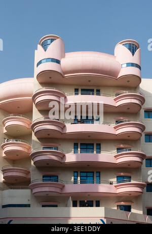 Modern pink apartment building in Deira,Dubai, UAE. Stock Photo