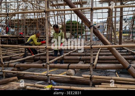 A general view showing a bamboo scaffolding theater under construction ...