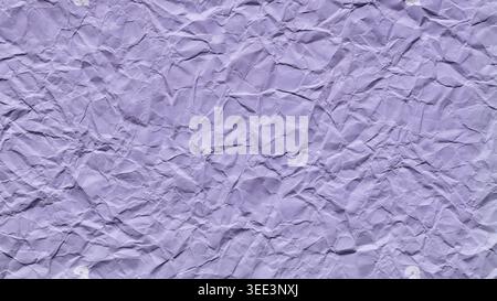 Crumpled purple paper texture with wrinkled surface creating abstract pattern background Stock Photo
