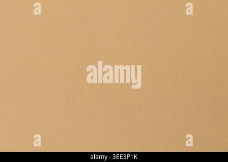 Warm beige kraft paper texture background with subtle grain for natural design projects Stock Photo