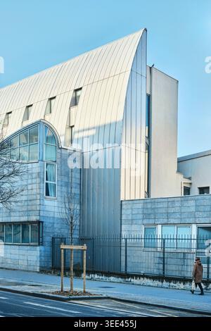 Lyon, France - March 19, 2026: Exterior view of the modern architectural design of the ENS Lyon campus building with its iconic curved metallic roof Stock Photo